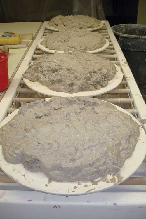 Place recycled clay on a porous surface and allow to dry. Flip the clay over occasionally then wedge and store. 