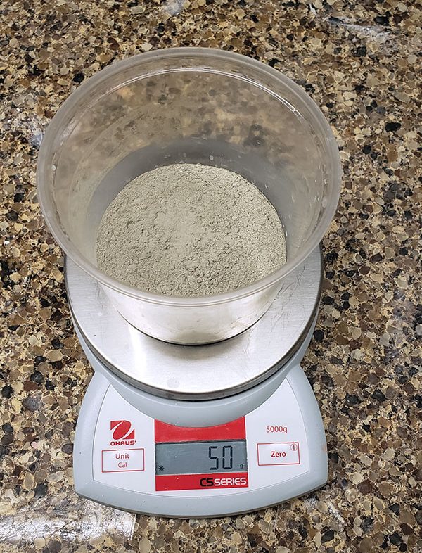 2 In a separate container, weigh out the dry bentonite.