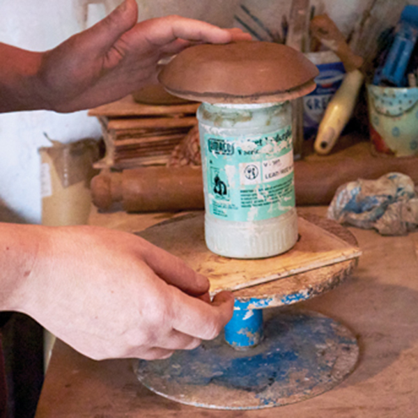 2 Press the round slab onto a 5-inch GR Pottery plate mold.