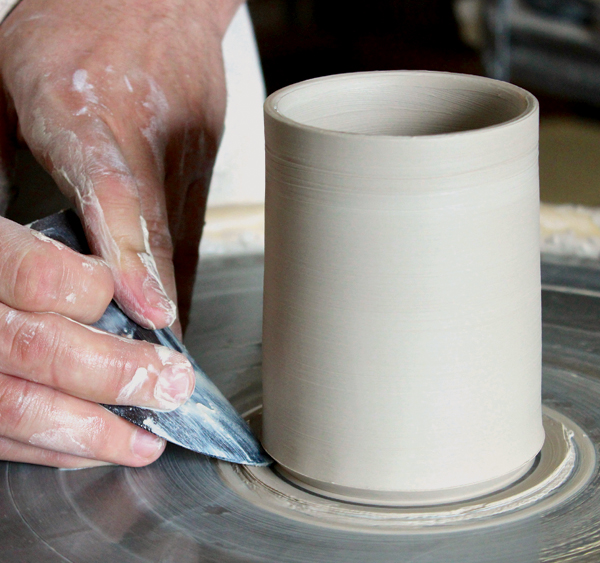 2 After straightening the vessel, the tip of the rib can be angled and pushed into the base of the form to create an undercut.