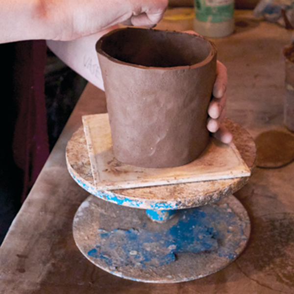 3 Form the main body of the jug using the conical slab cut from the template.