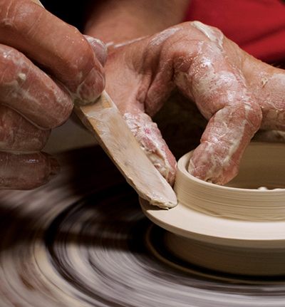 3 Measure the opening and throw a lid. Trim it when it’s leatherhard.