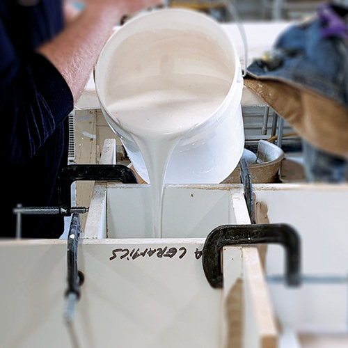 4 Pour the plaster into the mold, then gently shake the table to remove air bubbles.