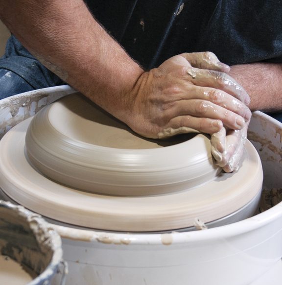 6 Center around 6 pounds of clay for the cooktop pan.