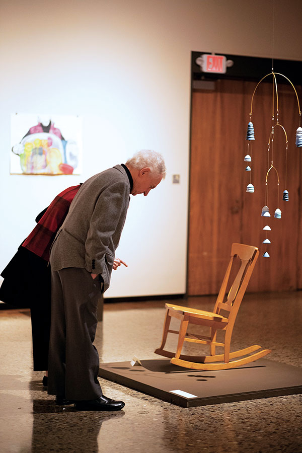 5 Documentation of Impacts, rocking chair and mobile, while on exhibit at the Canton Museum of Art in Canton, Ohio. Photo: Casey Polatas.