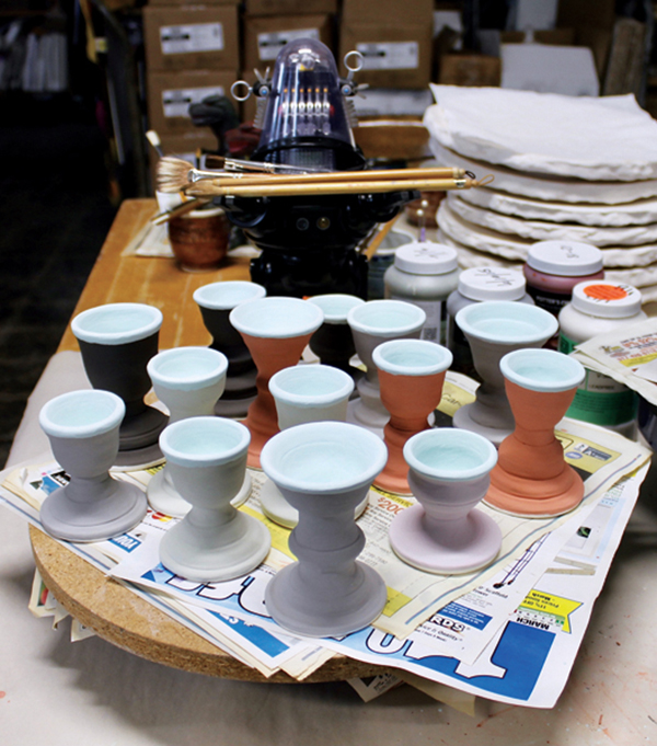 9 Glaze each egg cup with food-safe glazes, experimenting with the exteriors.