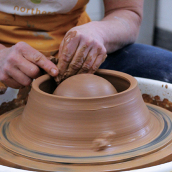 Pottery bowl with a small conical ring of clay in the center : r
