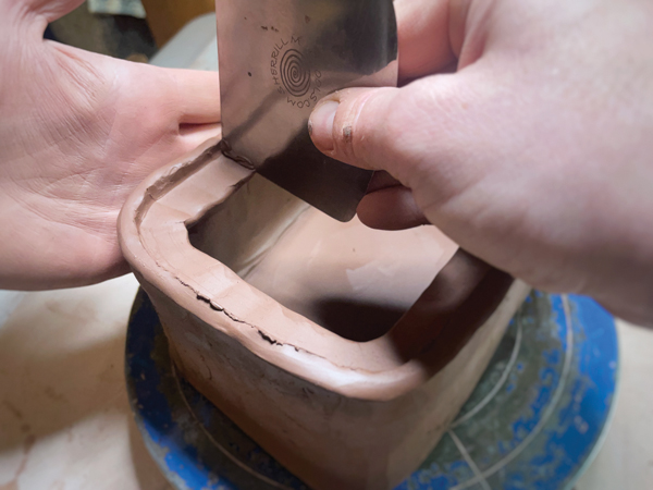 9 Work around the gallery until it feels even, then use your fingers to smooth and finish the underside of the coil. 