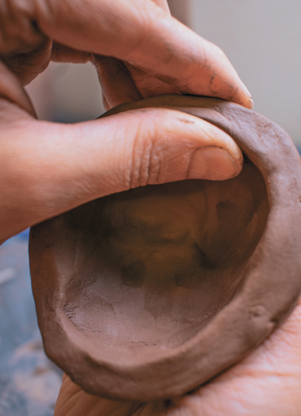 10 Create a lid from an oval pinch pot. Use a rasp to refine and make the lid light.