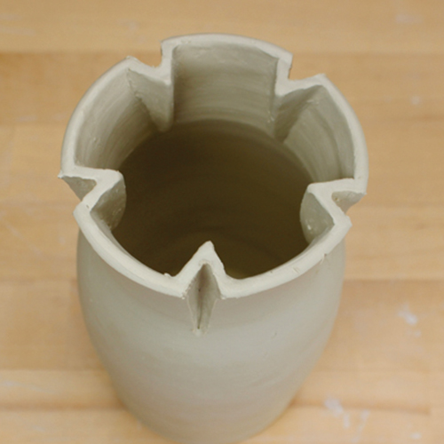 12 Repeat this for all five points around the vase, then refine the edges.