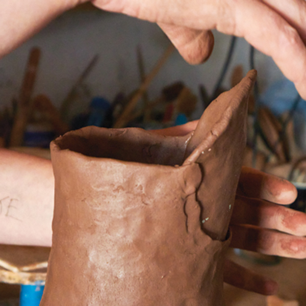 12 Attach and blend the spout to the body of the jug.