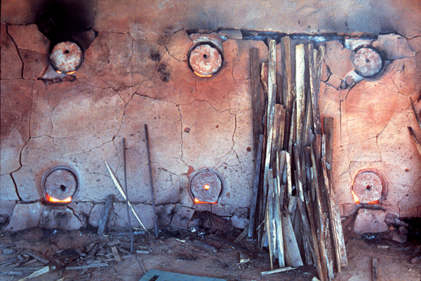 12 The kiln has seven distinct chambers. Each chamber is served by a total of 26 stoke holes aligned on opposite sides of the kiln.