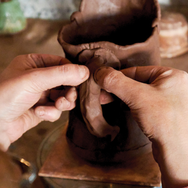 15 Add a pinched handle to the jug, then refine its shape.