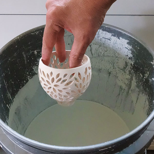 18 Dip the covers in glaze quickly to prevent oversaturating the bisque-fired clay. Fully dry the glazed form before firing again.