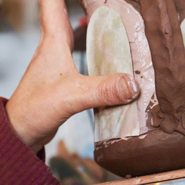 18 Apply the slip-coated transfers to the jug while both surfaces are still wet.