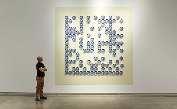 1 Aaron Nelson’s Pixel, 10 ft. (3 m) in length, up-cycled vintage porcelain plates, steel, rare earth magnets, digital decals, 2013.
