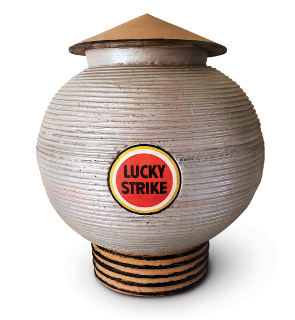 Lucky Strike Water Tank, 14 in. (36 cm) in height, earthenware,  commercial overglazes, fired in an electric kiln to cone 06, decal  fired to cone 017, sandblasted. 