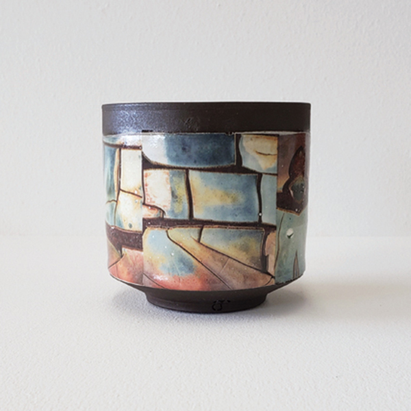 2 Lex Feldheim’s cup, 5 in. (12 cm) in height, stoneware, color waterslide decals, fired to cone 6 and then cone 013 in an electric kiln. 
