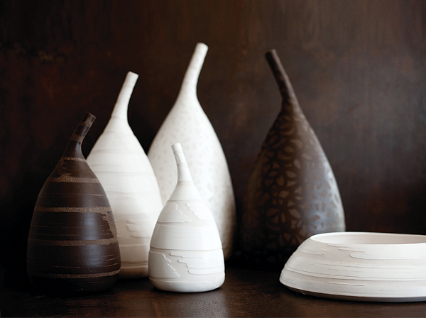 8 Favo Vases, to 25½ in. (65 cm) in height, wheel- and hand-modeled refractory clay, terra sigillata, reserve technique, 2002. Photo: Max Tassotto.