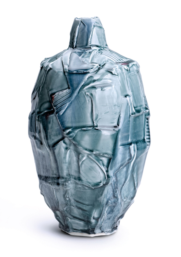 2 Layne Peters’ bottle, carved porcelain, slip, celadon glazes.