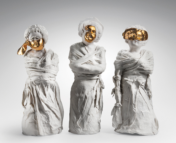 8 Chapman’s Gold Masked Women, featured on the marketing materials for the “Eighty-Six Reasons for Asylum Admission” exhibition.