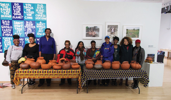 1 A few Crafting Community workshop participants with their finished, collaboratively made vessels prior to a drum-processional to the African American Museum in Philadelphia, 2018. 