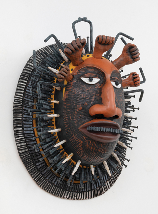 4 Sharif Bey’s Protest Shield with Fists, 23½ in. (60 cm) in height, earthenware, mixed media, 2021.