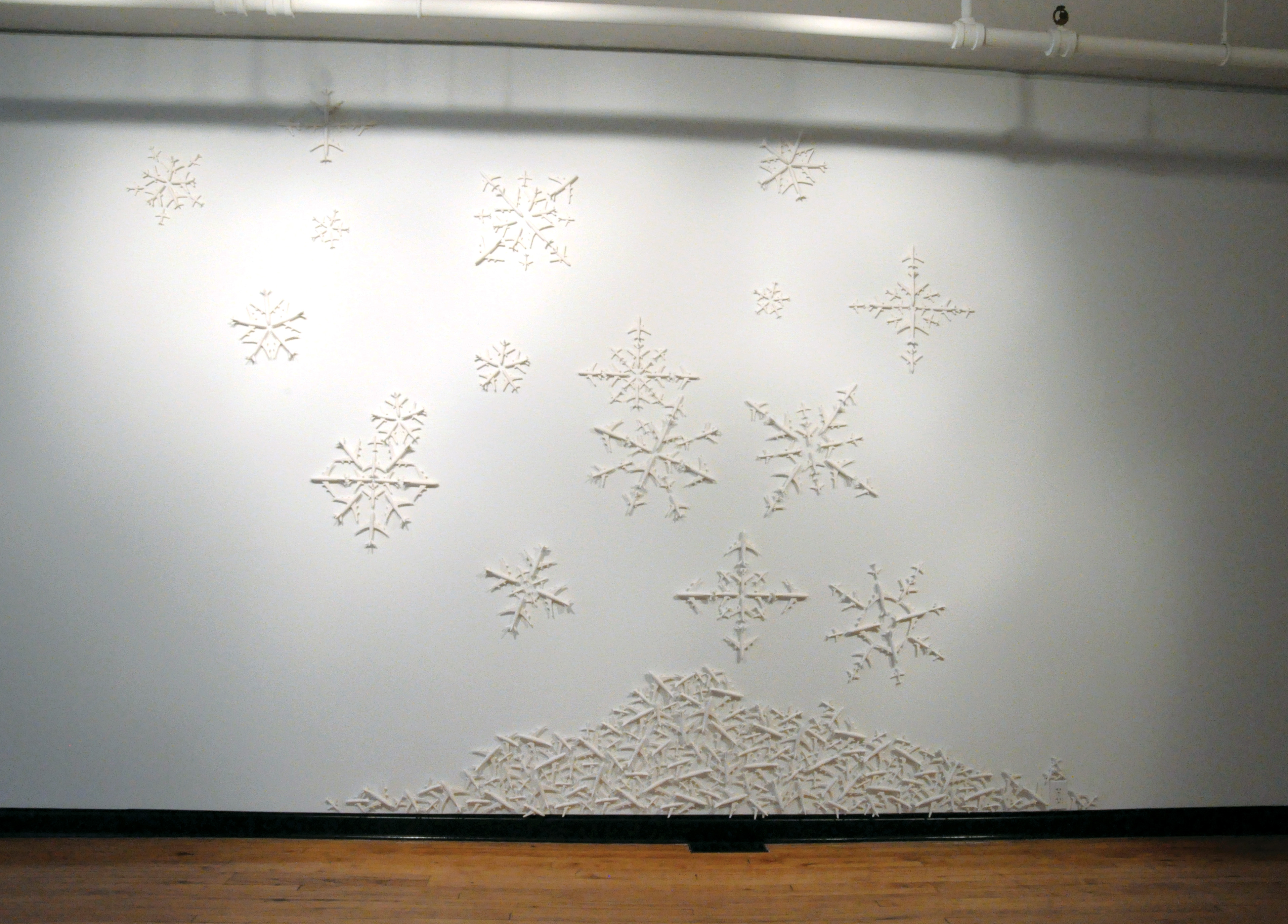 Accumulation, 10 ft. (3 m) in width, bisque-fired porcelain, 2013.