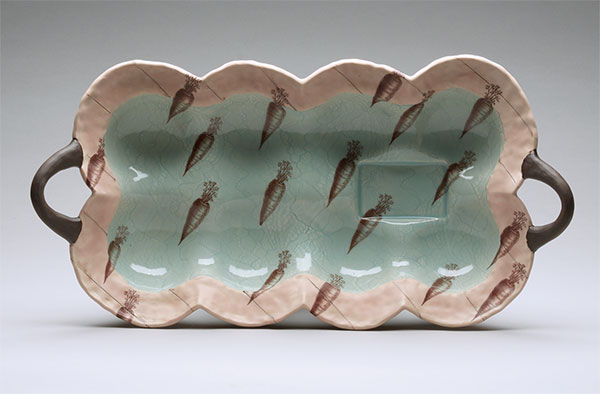 Platter with loop handles, 16 in. (41 cm) in width, draped and pinched white clay with underglazes, glazes, decals, fired to cone 5, 2019.