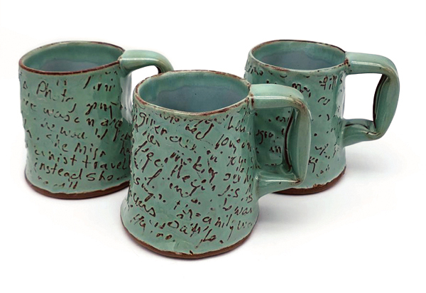 Three mugs, 4½ in. (11 cm) in height, earthenware, fired to cone 6 in oxidation, 2022.