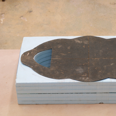 1 Create a tar-paper platter template. Stack foam for a slump mold with an opening 1½ inch from the template’s edge. 