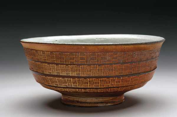 4 Bowl, 12 in. (30 cm) in length, soda-fired stoneware with inlay from a digitally printed roulette, 2021. Photo: Elizabeth Lamark. 