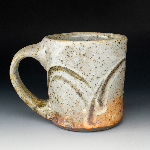 Finger swipe mug, 5 in. (13 cm) in length, iron-rich clay, slip, glaze.