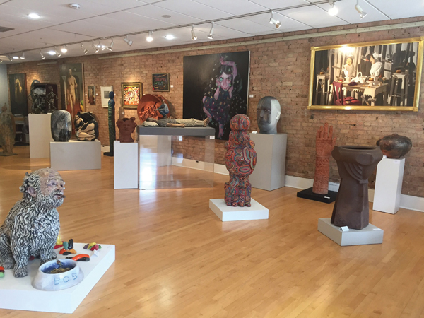 Foreground, left to right: works by Robert Arneson, Michael Lucero, Sergei Isupov, Peter Gourfain, William Daley, and Rick Dillingham.