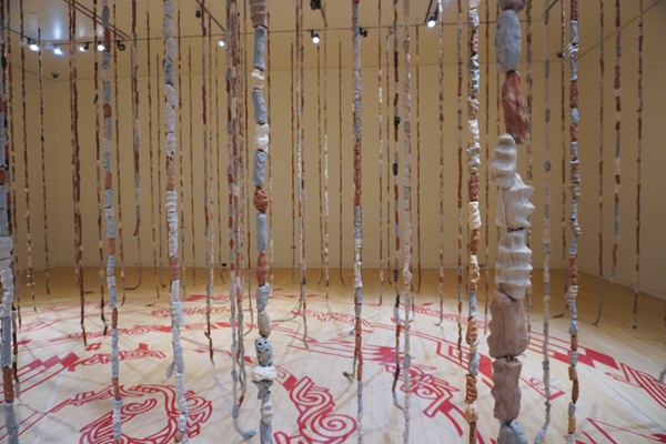 13 Something To Hold Onto, approximately 42 ft. (12.8 m) in width, immersive installation, social collaboration, 9000+ unfired clay beads, 2021. 