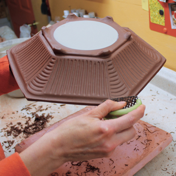 9 Carve surface texture using loop tools and trim the rim edge using a small rasp tool. You are now ready to decorate!