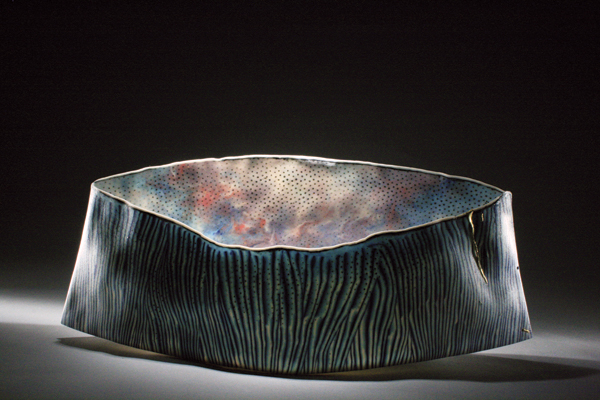 8 Curtis Benzle’s Vieques, 15 in. (38 cm) in length, handbuilt, colored porcelain, epoxy, gold leaf.