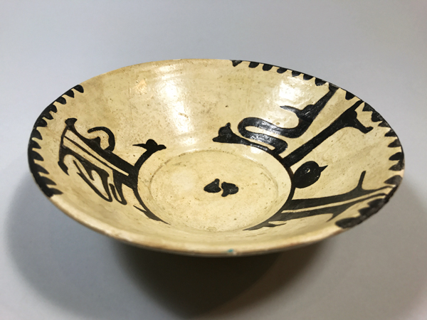 5 Unknown maker’s bowl with Kufic script, earthenware. 