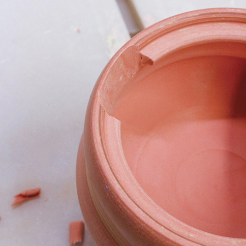 7 Before the walls are too dry, use a sharp knife to cut a small pouring spout.