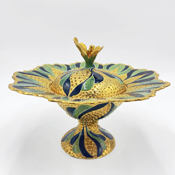 1 Joan Takayama-Ogawa’s Chrysanthemum (Covered Container), 12 in. (30 cm) in height, earthenware, glaze, 1992. Photo: Madison Metro, Craft in America.