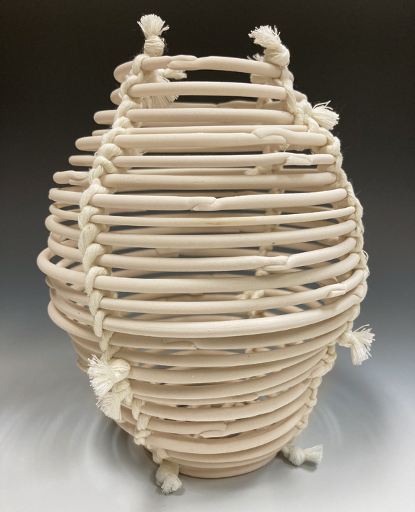 4 Michelle Tobia’s Reprise Series Mini Moon Jar, 6¾ in. (17 cm) in height, cone-6 porcelain, single-strand recycled cotton cord, 2022. 