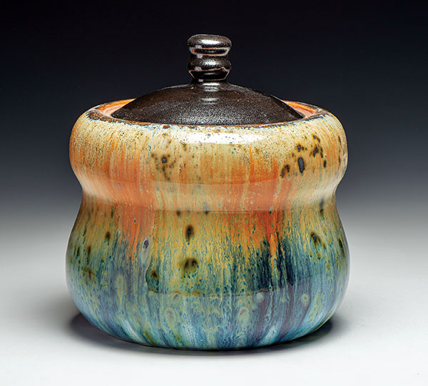 7 Lidded Jar/Mizusashi, 9 in. (23 cm) in height, Oni-glazed with 8 glazes (application methods included dipping, pouring, and spraying); dry shakings of wood ash, volcanic ash, colorants, fluxes, and frits; reduction fired in a gas kiln to cone 9–10. 