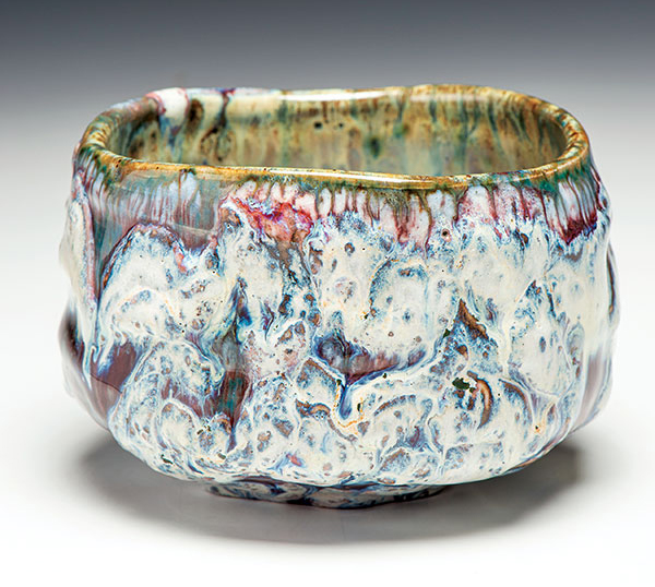 8 Teabowl/Chawan, 4¼ in. (11 cm) in height, Oni-glazed with 9 glazes (application methods included dipping, pouring, brushing, trailing, and spraying); dry shakings of wood ash, volcanic ash, colorants, fluxes, and frits; also poured application of Custer feldspar mixed with water; reduction fired in a gas kiln to cone 9–10. 