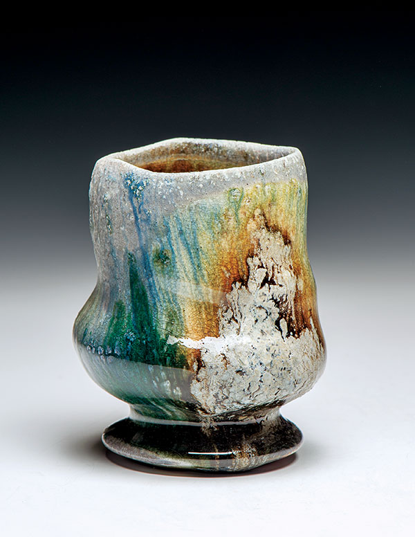 3 Cup/Yunomi, 4½ in. (11 cm) in height, Oni-glazed with 10 glazes (application methods included dipping, pouring, brushing, trailing, and spraying); dry shakings of wood ash, volcanic ash, colorants, fluxes, and frits; wood fired for 100 hours. 