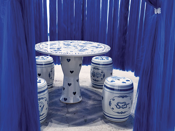 1 Jennifer Ling Datchuk’s How I came to my table, 34 in. (86 cm) in height; porcelain table and stools made in collaboration with a table and stool factory in Jingdezhen, China; blue-and-white pattern transfers; cobalt decoration; 2019. 