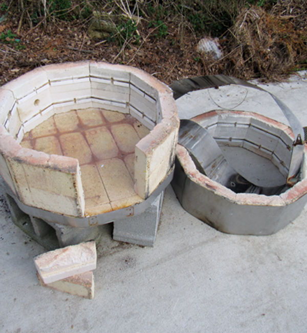 13 Remove the sheet metal and one side of soft brick to create the firebox door.