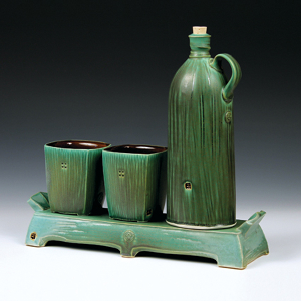 Dark-green whiskey set, 14 in. (36 cm) in length, porcelain jug and cups, white stoneware tray, fired to cone 6 in an electric kiln, slow cooled.