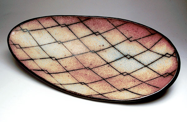 8 Drop shaped tray, 16½ in. (42 cm) in length, slab-built porcelain (formed in a hump mold). 