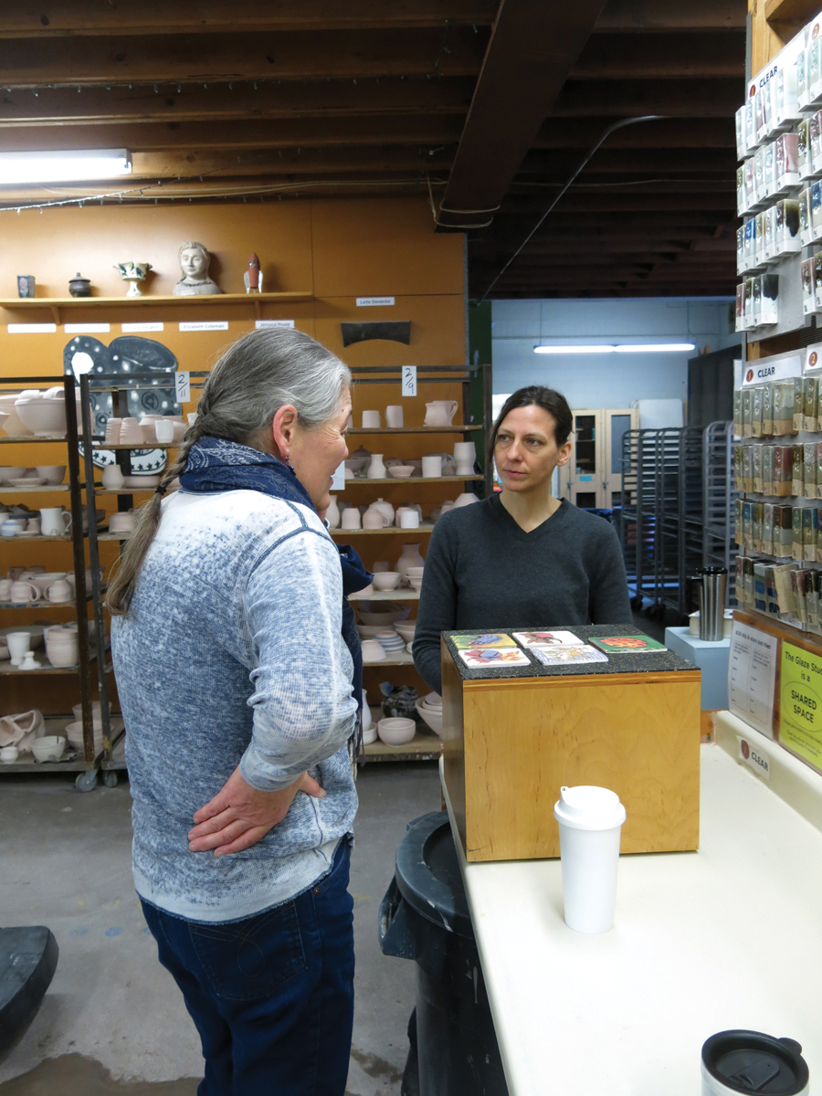 5 Ursula Hargens (right) discusses work in an individual critique with a student in the MN NICE program.