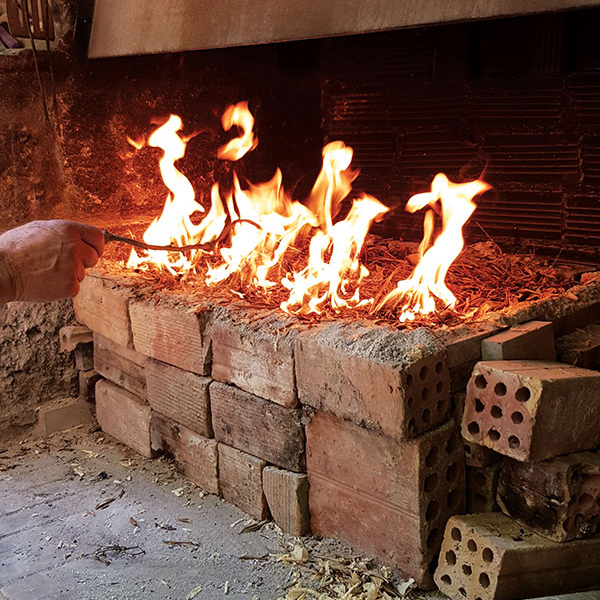 4 The brick chamber for smoke firing, filled with sawdust and various other combustibles, Gra Kera, Crete, 2019. Photo courtesy of the artist. 